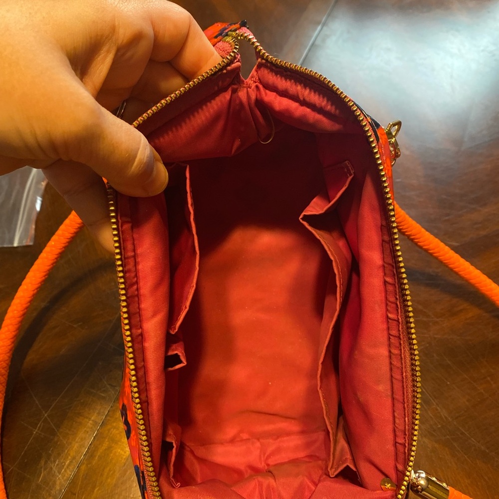 Tory Burch Red-Orange Floral Crossbody Wristlet with Navy Accents - Picture 8 of 16